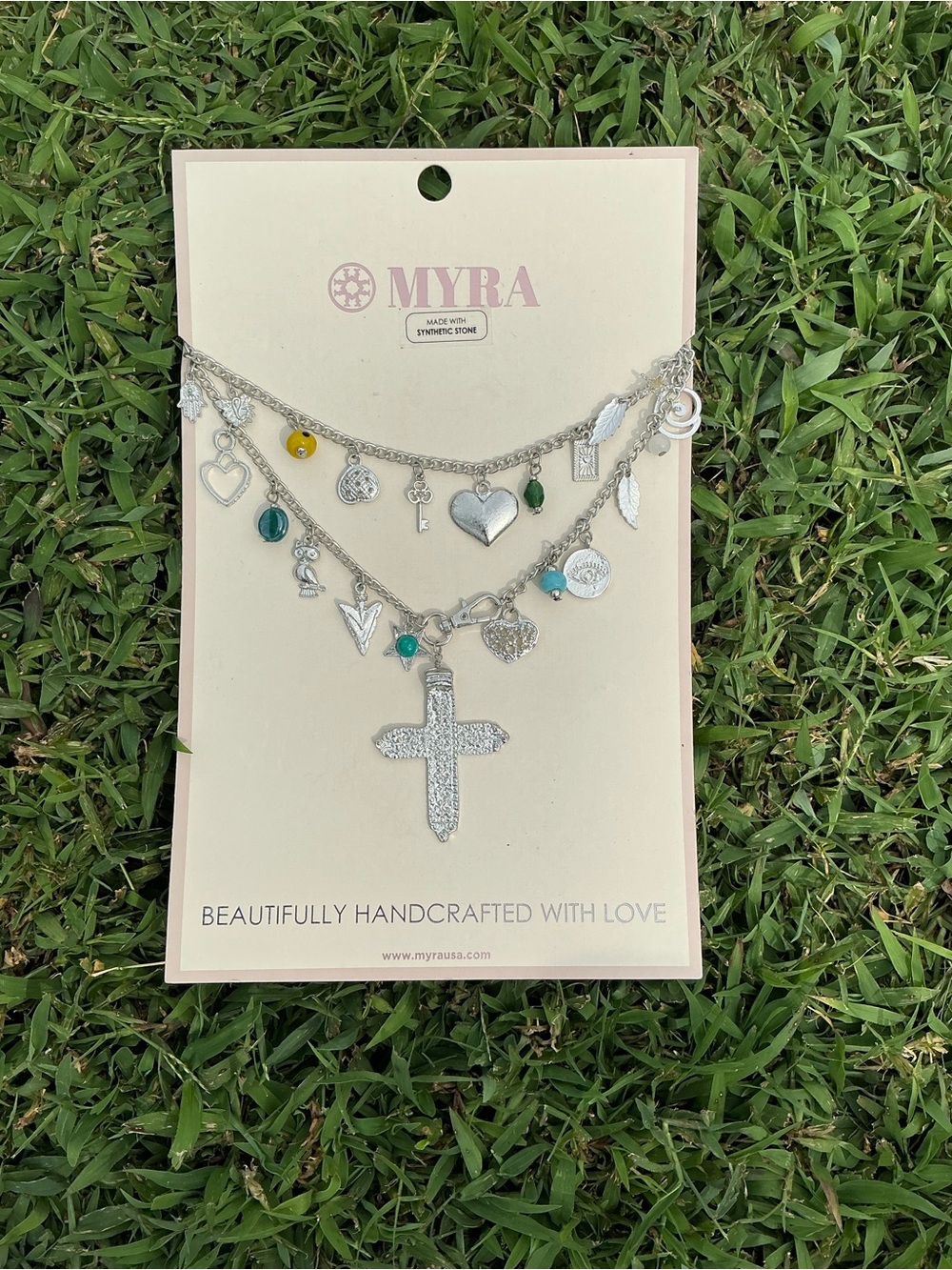 Myra Bag Silver Layered Cross & Charm Necklace with Teal and Yellow Accents